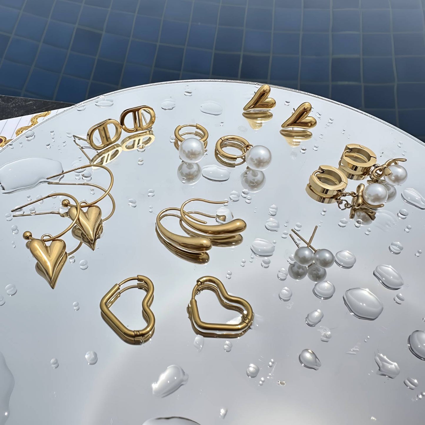 FÜLBEVALÓ, 18K ARANYOZOTT NEMESACÉL