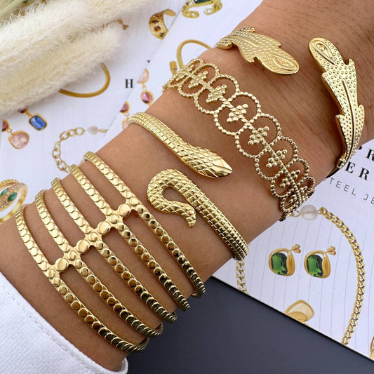 KARKÖTŐ, 18K  ARANYOZOTT NEMESACÉL