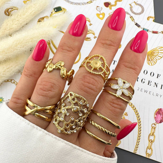 VIRÁG GYŰRŰ, 18K  ARANYOZOTT NEMESACÉL