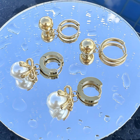 FÜLBEVALÓ, 18K  ARANYOZOTT NEMESACÉL