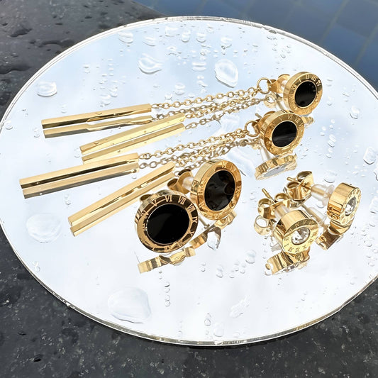 FÜLBEVALÓ, 18K  ARANYOZOTT NEMESACÉL