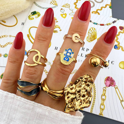 GYŰRŰ, 18K  ARANYOZOTT NEMESACÉL