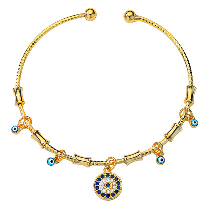 GONOSZ SZEMEK KARKÖTŐ, 18K  ARANYOZOTT NEMESACÉL