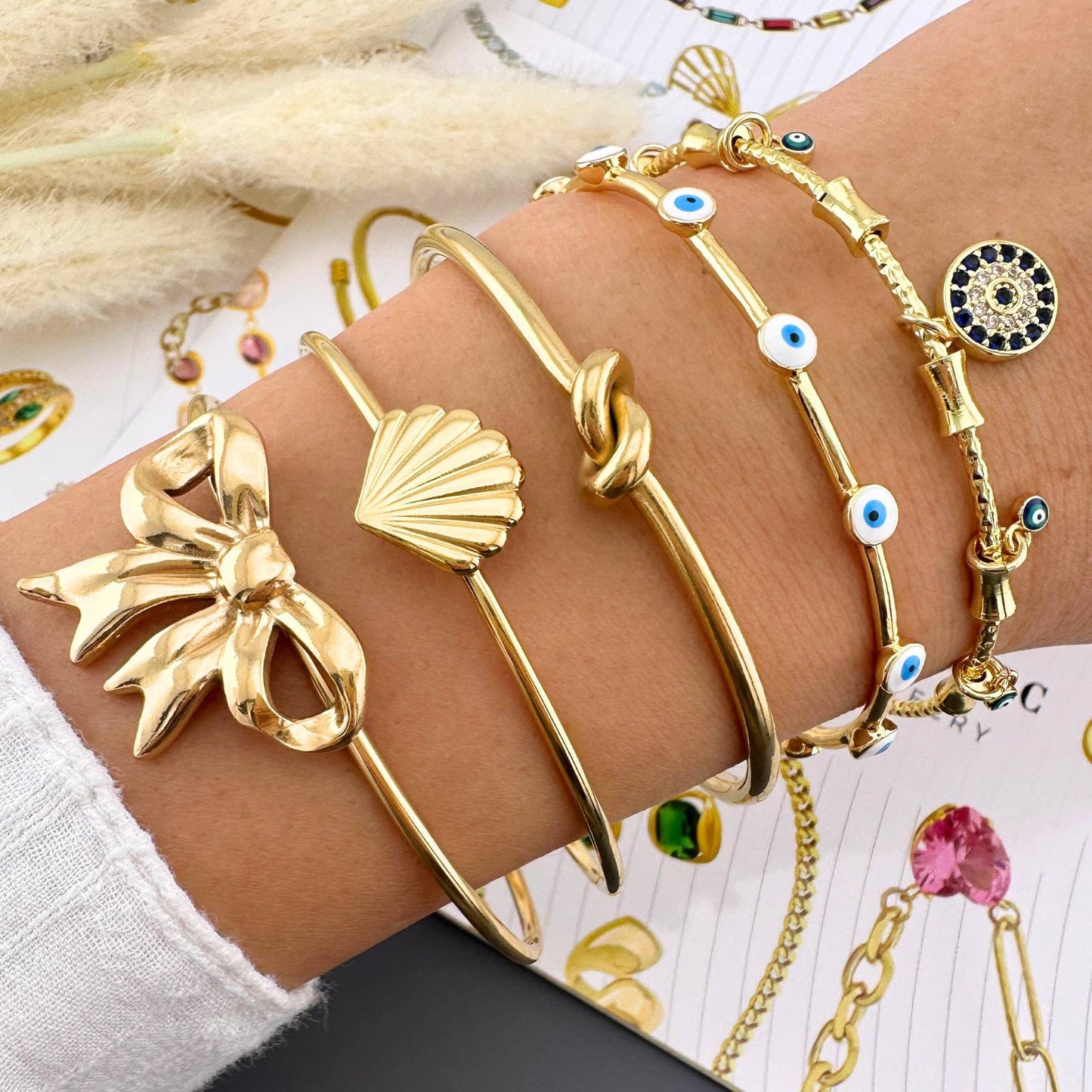 GONOSZ SZEMEK KARKÖTŐ, 18K  ARANYOZOTT NEMESACÉL