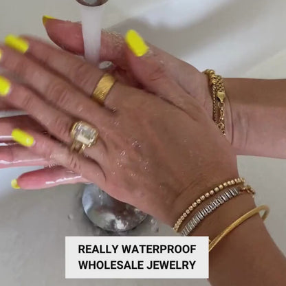 GYŰRŰ, 18K ARANYOZOTT NEMESACÉL