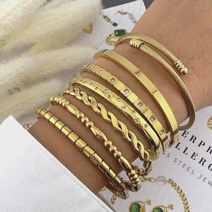 CSILLAG KARKÖTŐ, 18K  ARANYOZOTT NEMESACÉL