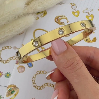 KARKÖTŐ, 18K  ARANYOZOTT NEMESACÉL