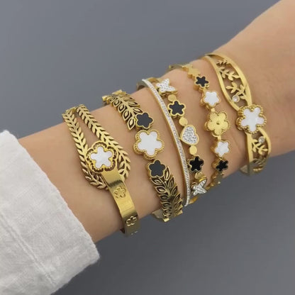 VIRÁGOS RÉT KARKÖTŐ, 18K  ARANYOZOTT NEMESACÉL