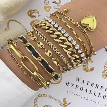 TENISZ KARKÖTŐ, 18K  ARANYOZOTT NEMESACÉL